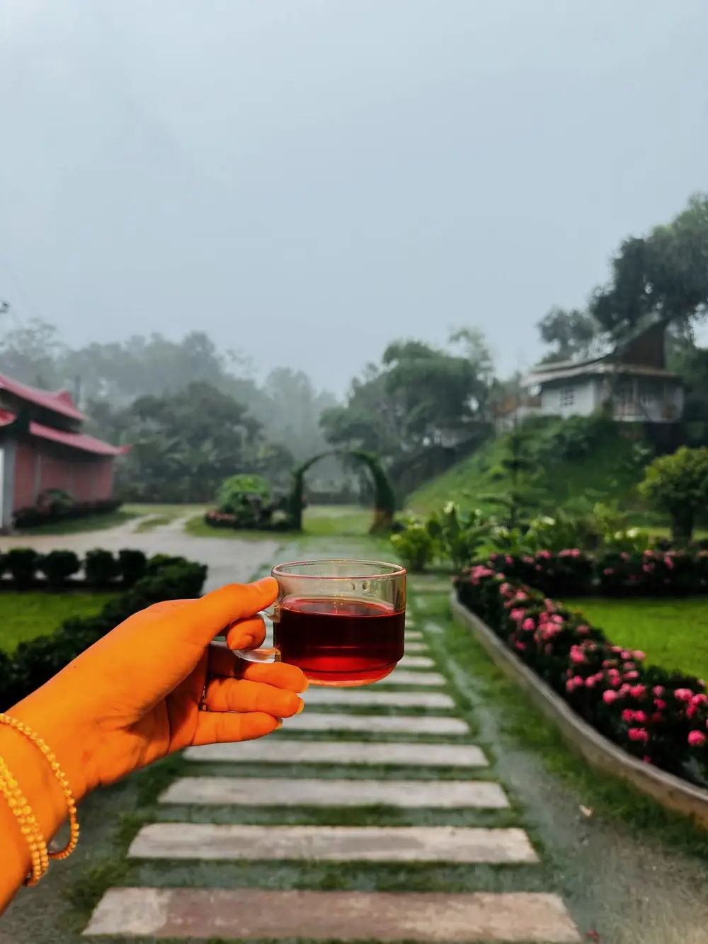 A cup of tea on the stepping-stone path on a misty morning
